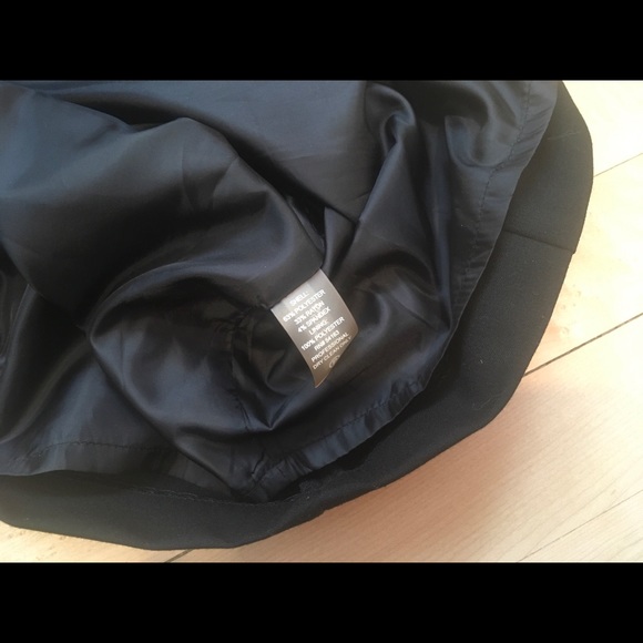 Lovely Calvin Klein black fitted dress, with gold accent pockets. - Picture 13 of 16